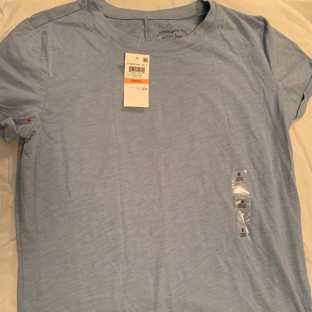 Light blue tee tag still on size small